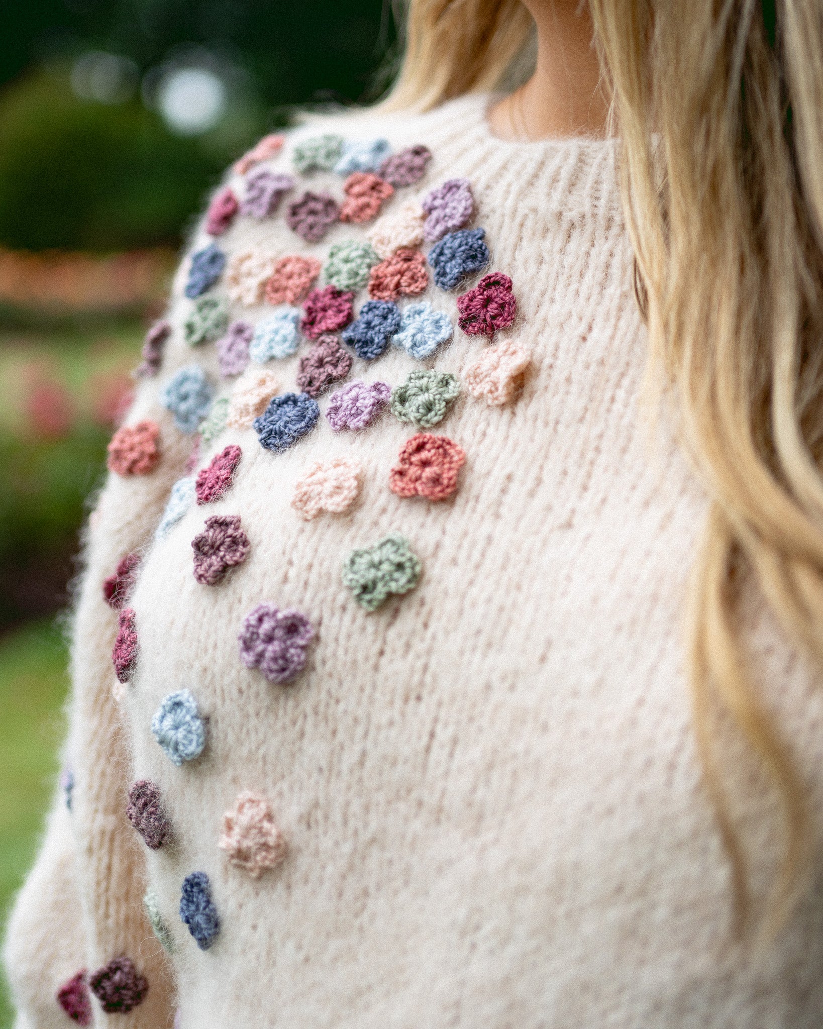 cascading flowers sweater